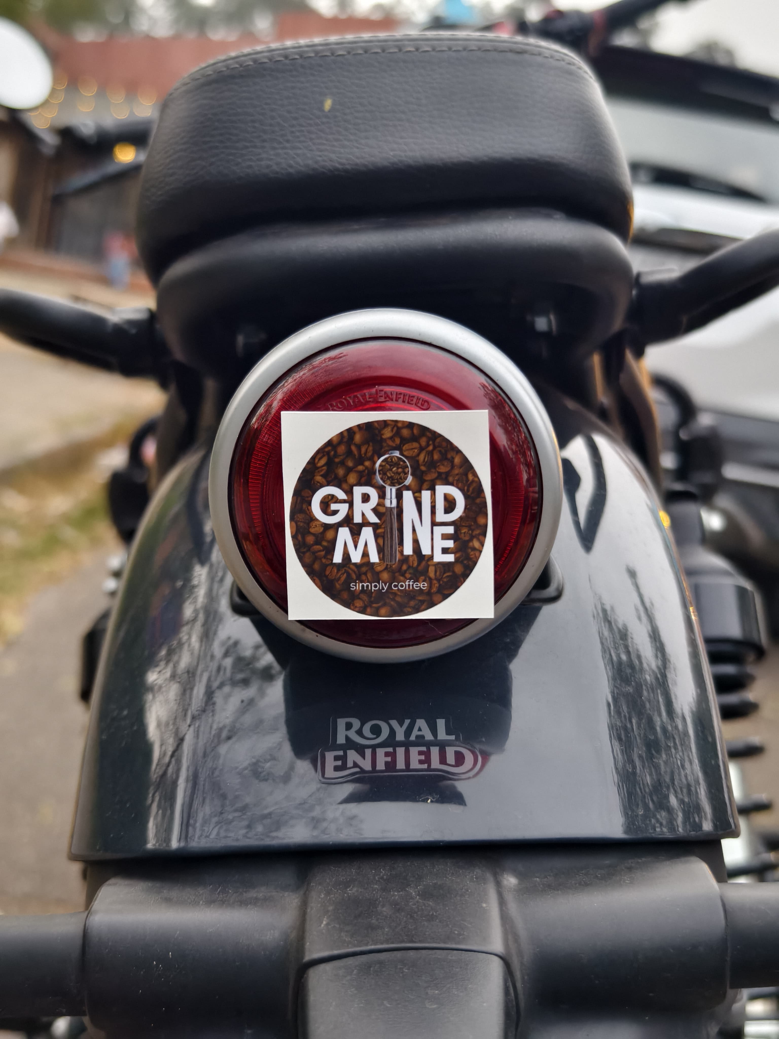 Sticker on a Royal Enfield tail light