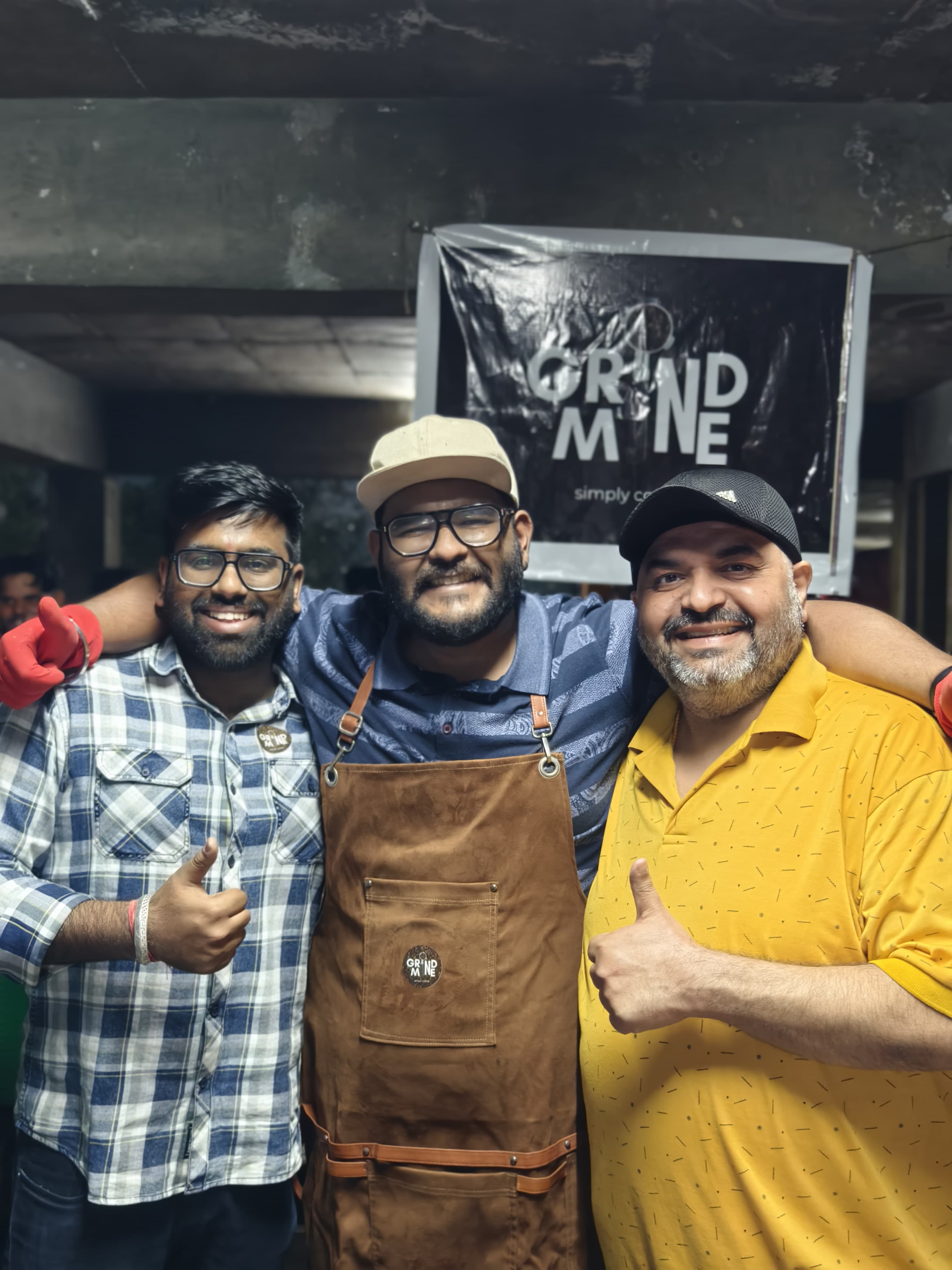 The tribe — three customers and the apron at an event